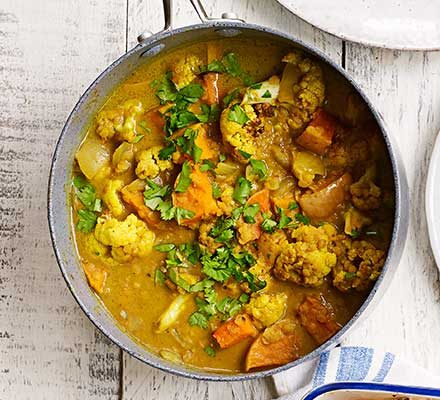 Curry de coliflor, calabaza, coco y lentejas